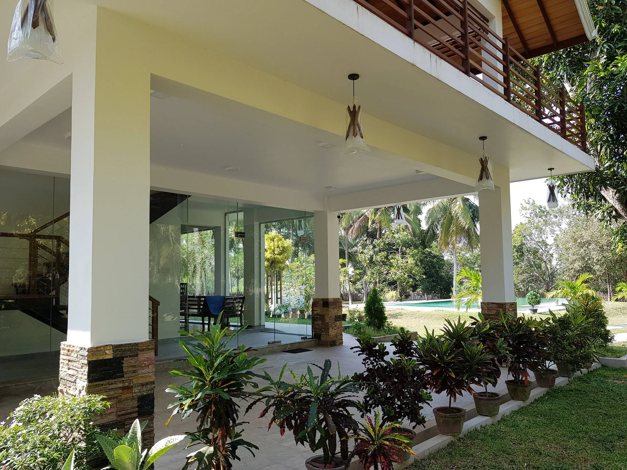 Actual covered veranda and exterior of the estate